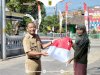 Semarakkan HUT ke-81 RI, Camat Ngawen Beserta Jajaran Bagikan Bendera Merah Putih kepada Warga